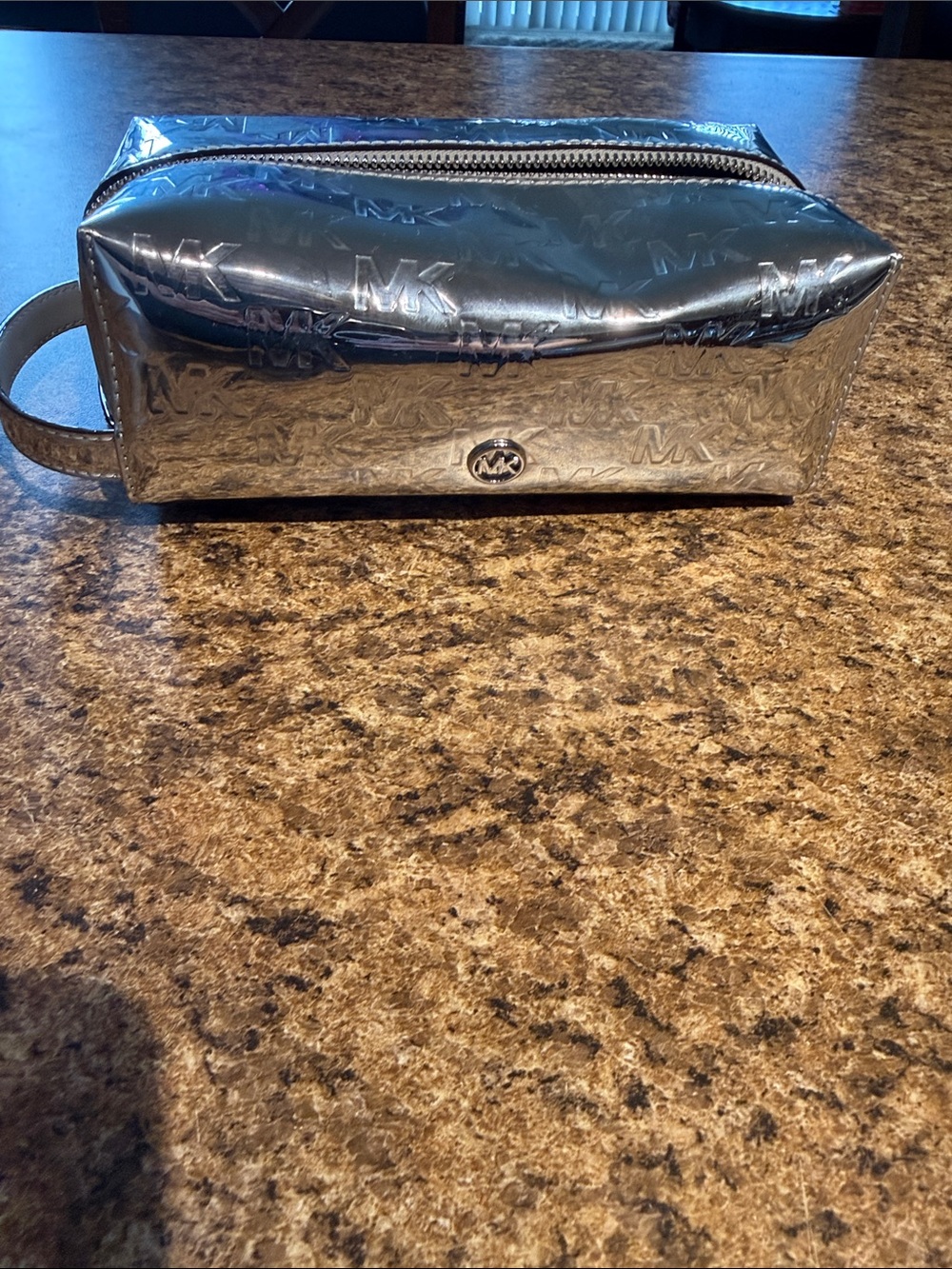 Michael Kors Metallic Silver MK Embossed Cosmetic Case